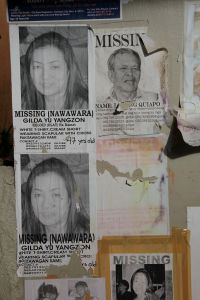A sad Missing Persons board outside the church in Tacloban