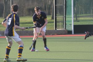 Matt playing hockey against Charterhouse - at least he avoided getting his face smashed with a hockey stick this year!